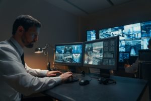 Man working within a government SCIF, with extra privacy through sound masking