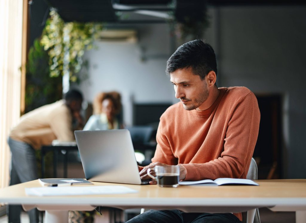 A Focused Businessman Working On His Computer